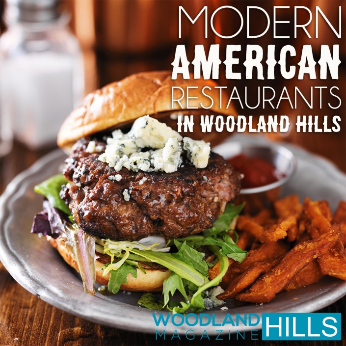 gourmet burger with blue cheese and sweet potato fries on metal