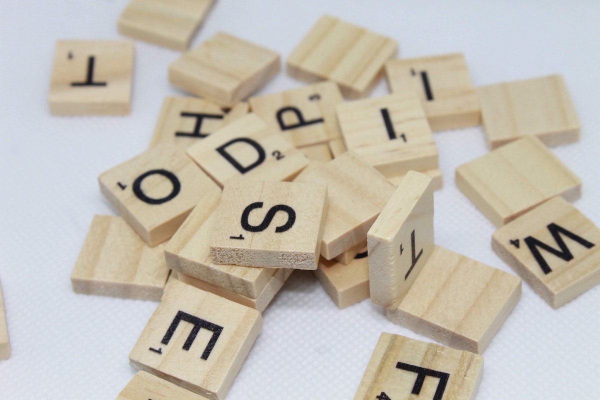 Content marketing agency picture of scrabble tiles to visualize typos